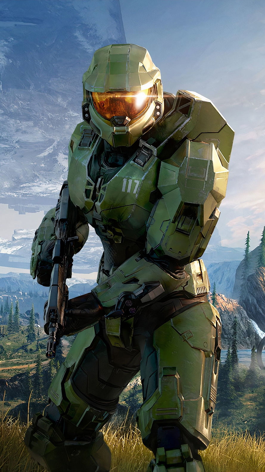 Master Chief in green Mjolnir armor holding a rifle against a mountainous sci-fi landscape background HD phone wallpaper