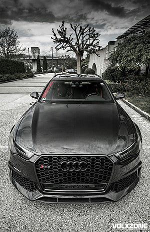 Front View of a Carbon Fiber Audi RS6 Avant with Dramatic Black and White Sky HD phone wallpaper