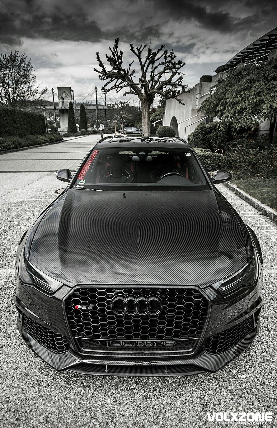 Front View of a Carbon Fiber Audi RS6 Avant with Dramatic Black and White Sky HD phone wallpaper