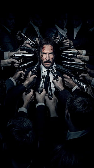 John Wick Surrounded by Guns in Dark Suit HD phone wallpaper