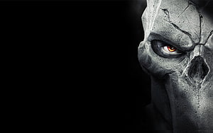Dark Fantasy Stone Skull with Glowing Red Eye on Black Background HD wallpaper