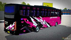 Jai Guru Kerala Tourist Bus Livery with Vibrant Pink and Black Graphic Design HD wallpaper