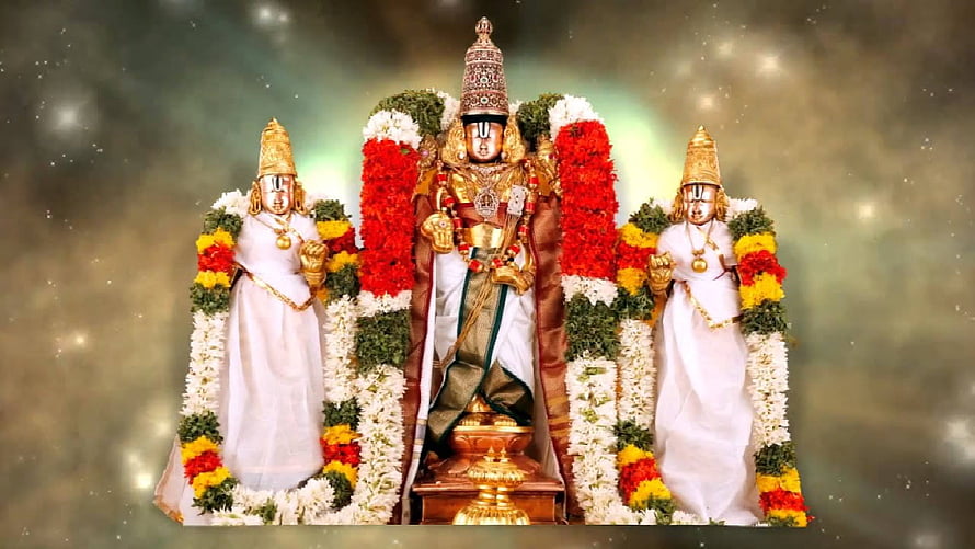 Lord Ayyappa with Sastha and Bhadrakali adorned in flowers and gold jewelry HD wallpaper
