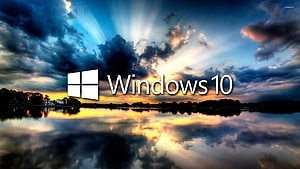 Windows 10 Logo Over Dramatic Lake Sunset With Cloud Reflections HD wallpaper