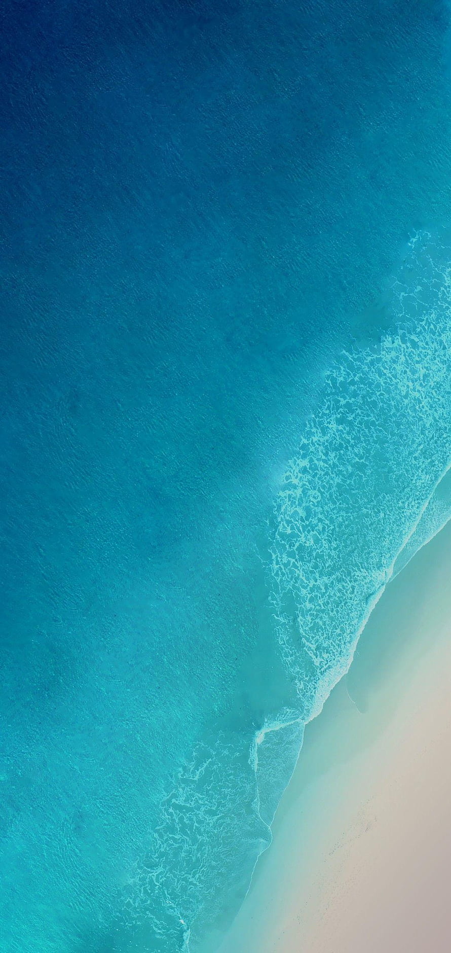 Aerial View of Turquoise Ocean Waves Washing Over White Sandy Beach HD phone wallpaper