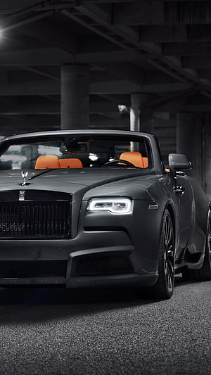 Matte Black Rolls-Royce Dawn Convertible with Orange Interior in Underground Garage HD phone wallpaper
