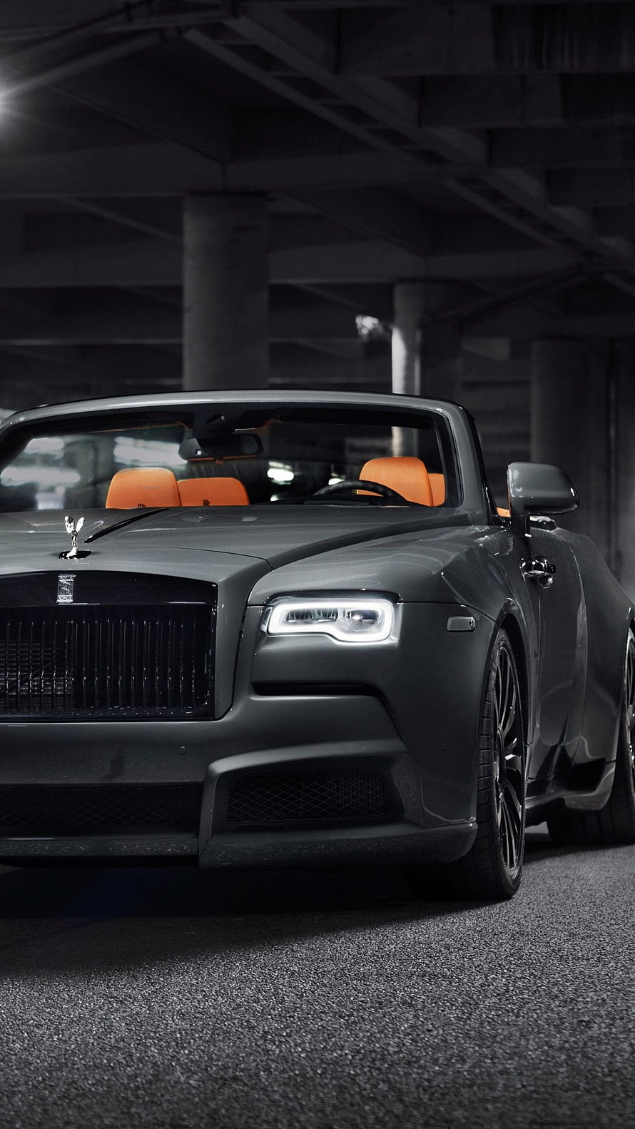 Matte Black Rolls-Royce Dawn Convertible with Orange Interior in Underground Garage HD phone wallpaper