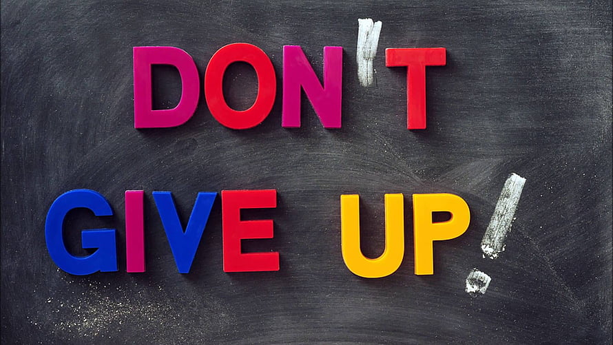 Colorful 3D Letters Spelling Don't Give Up on a Dark Chalkboard Background HD wallpaper