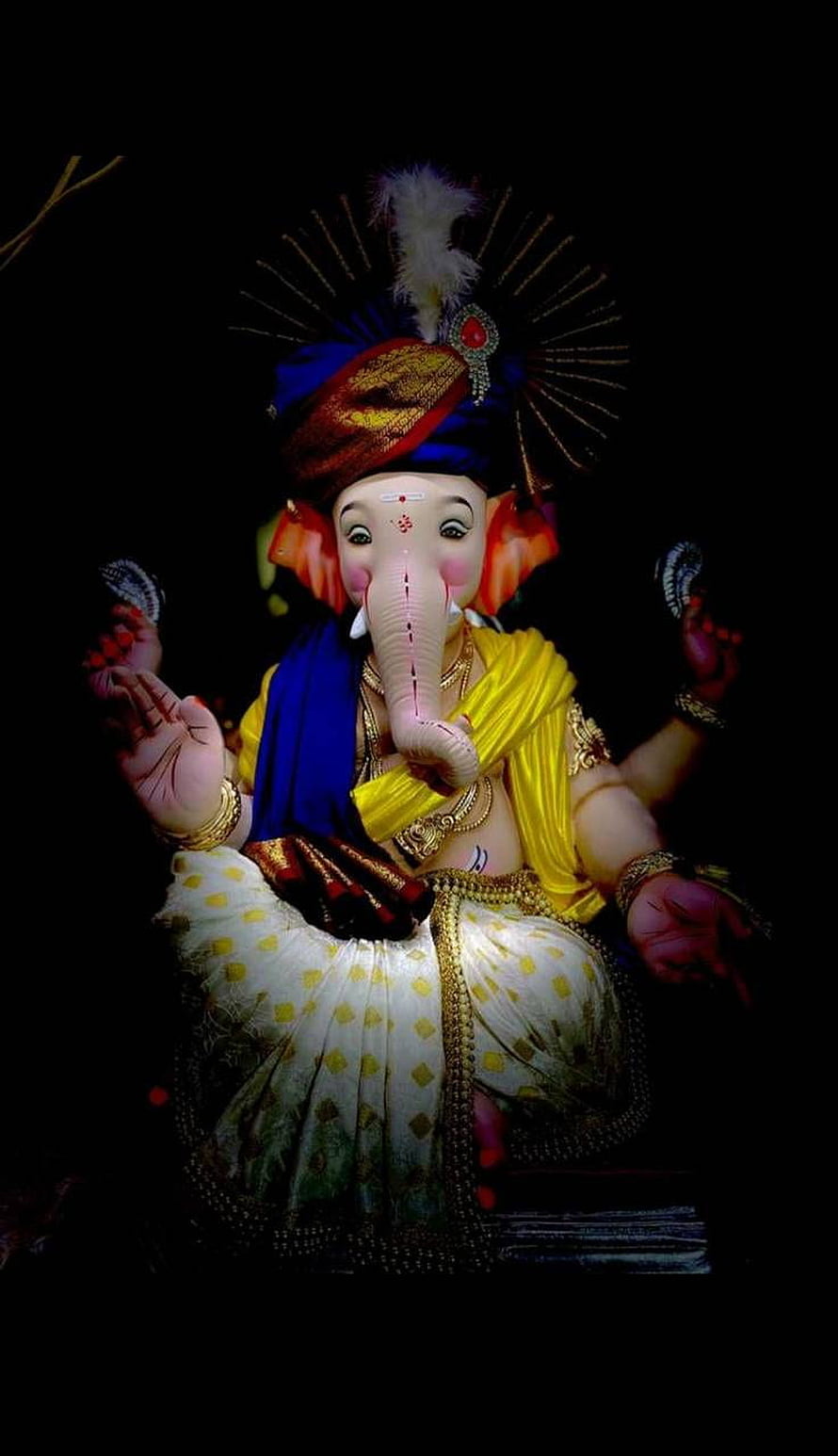 Colorful Ganesha Idol With Blue Turban And Yellow Saree On Black Background HD phone wallpaper