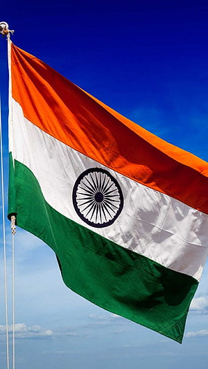 Indian National Flag Waving in the Wind Against a Clear Blue Sky HD phone wallpaper
