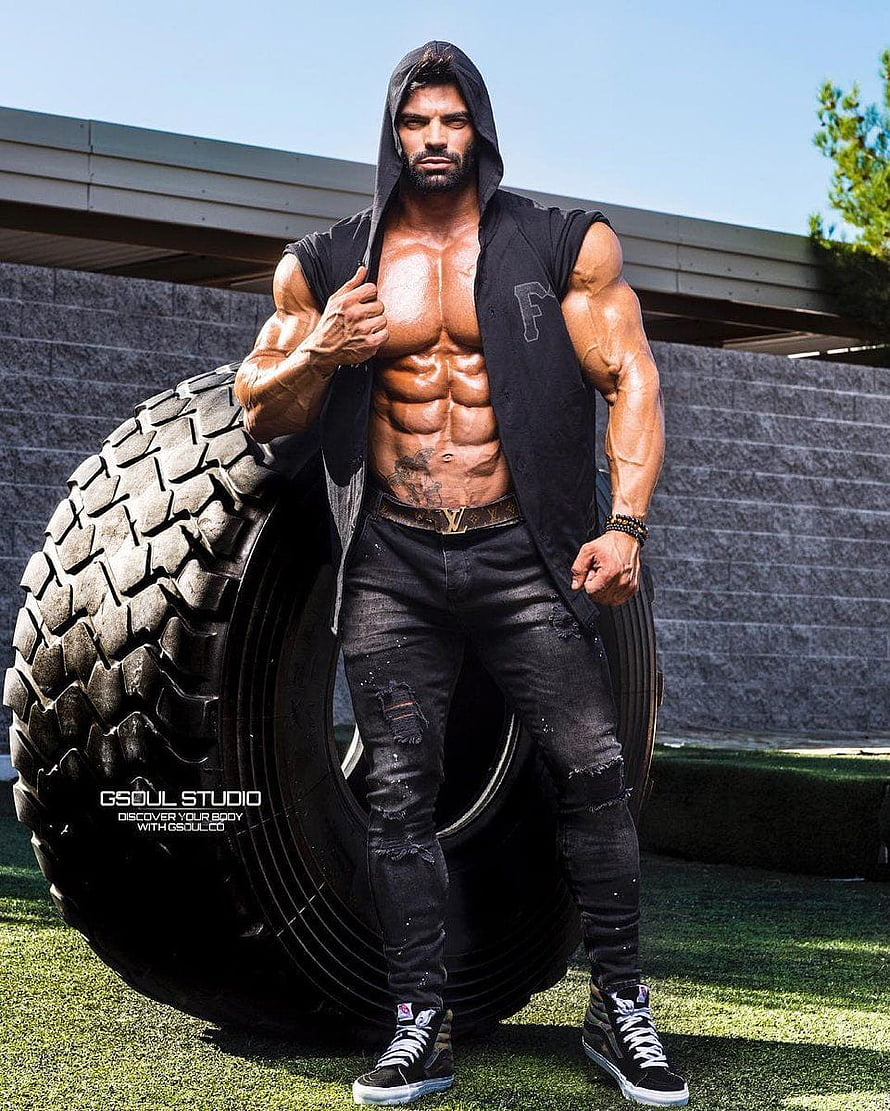 Sergi Constance Bodybuilder Fitness Portrait With Large Off-Road Tire HD phone wallpaper