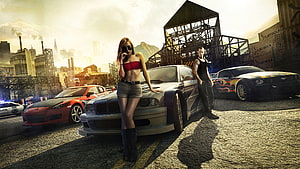 Need for Speed Most Wanted 2005 promotional artwork featuring characters and modified cars in an industrial setting HD wallpaper