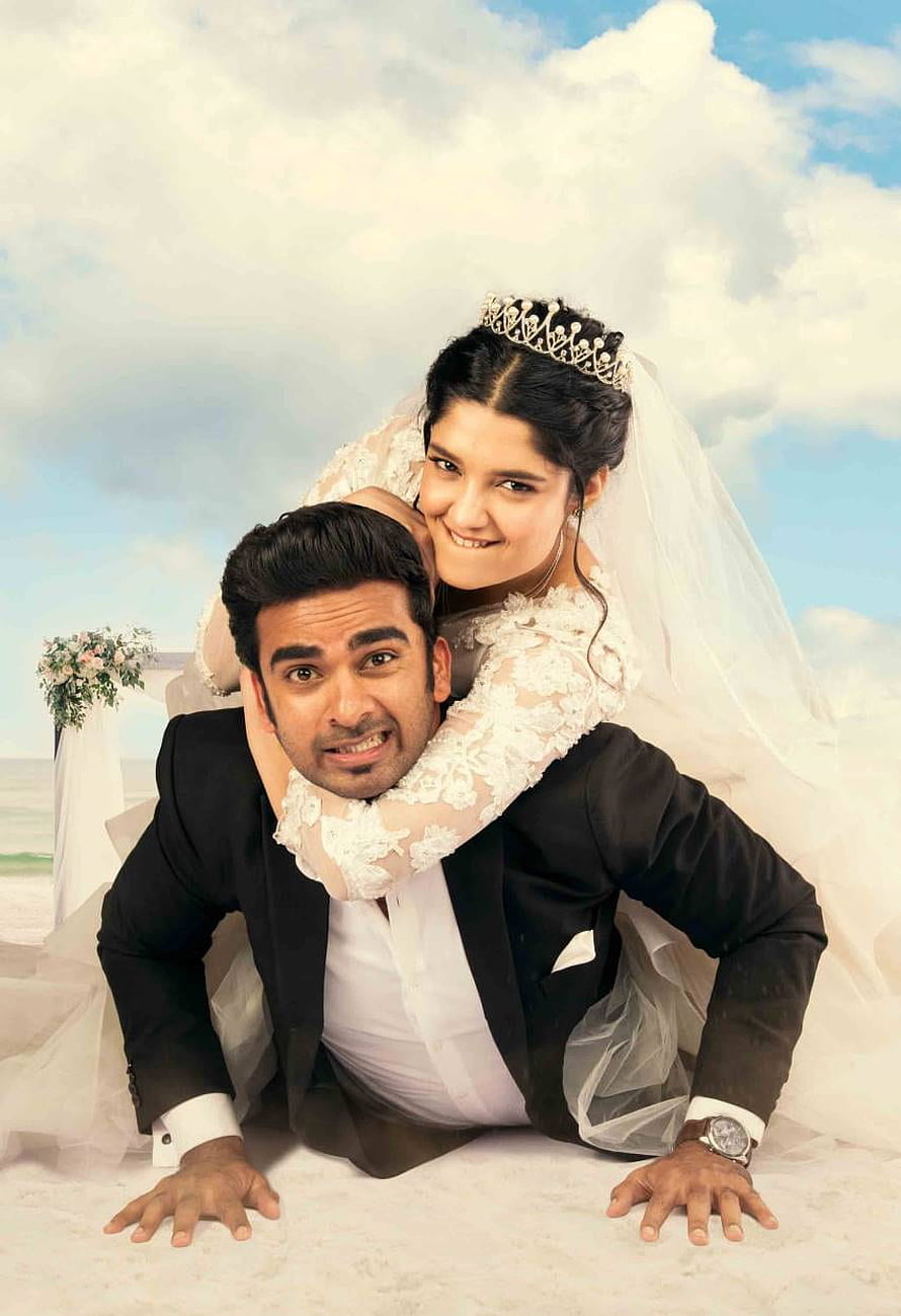 Oh My Kadavule Movie Still: Playful Beach Wedding Couple in Formal Attire HD phone wallpaper