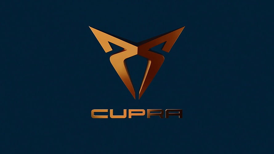 Cupra Automotive Brand Emblem in Metallic Gold on Dark Navy Background HD wallpaper