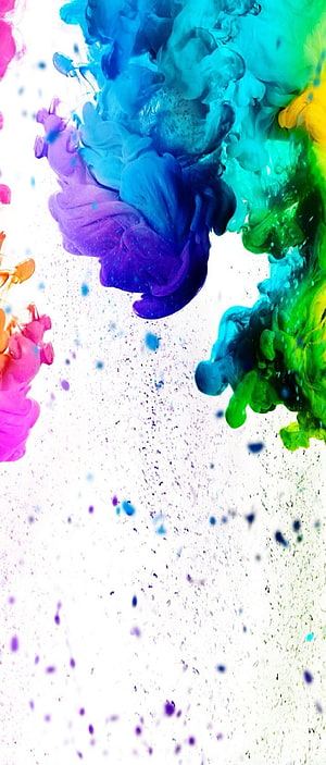 Vibrant multicolored ink clouds swirling in water with abstract fluid art design HD phone wallpaper