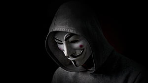 Anonymous Guy Fawkes Mask in Dark Hoodie Against Black Background HD wallpaper