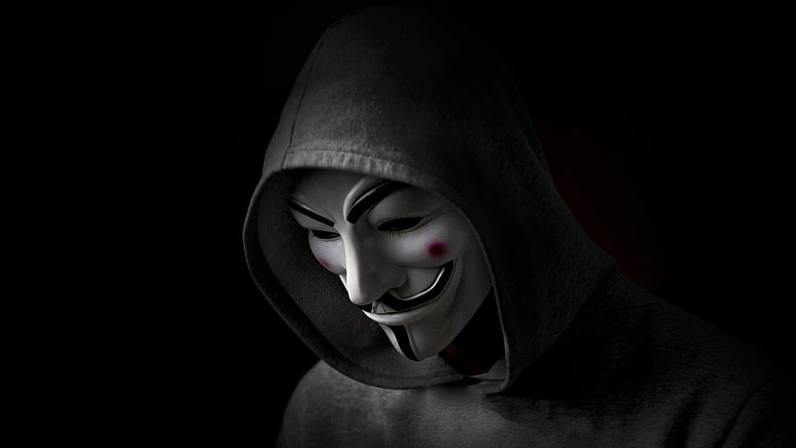 Anonymous Guy Fawkes Mask in Dark Hoodie Against Black Background HD wallpaper