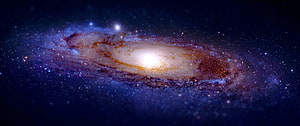 Andromeda Galaxy in Deep Space with Luminous Core and Dust Lanes HD wallpaper