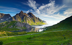 Stunning Norwegian Fjord Landscape with Green Hills and Mountains HD wallpaper
