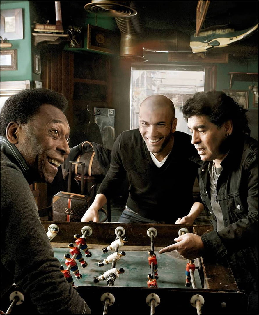 Pele, Zidane, and Maradona Playing Foosball in a Vintage Louis Vuitton Campaign HD phone wallpaper
