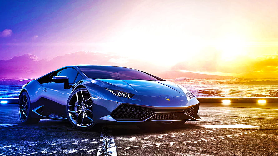Blue Lamborghini Huracan Super Sport Parked on Coastal Road at Sunset HD wallpaper