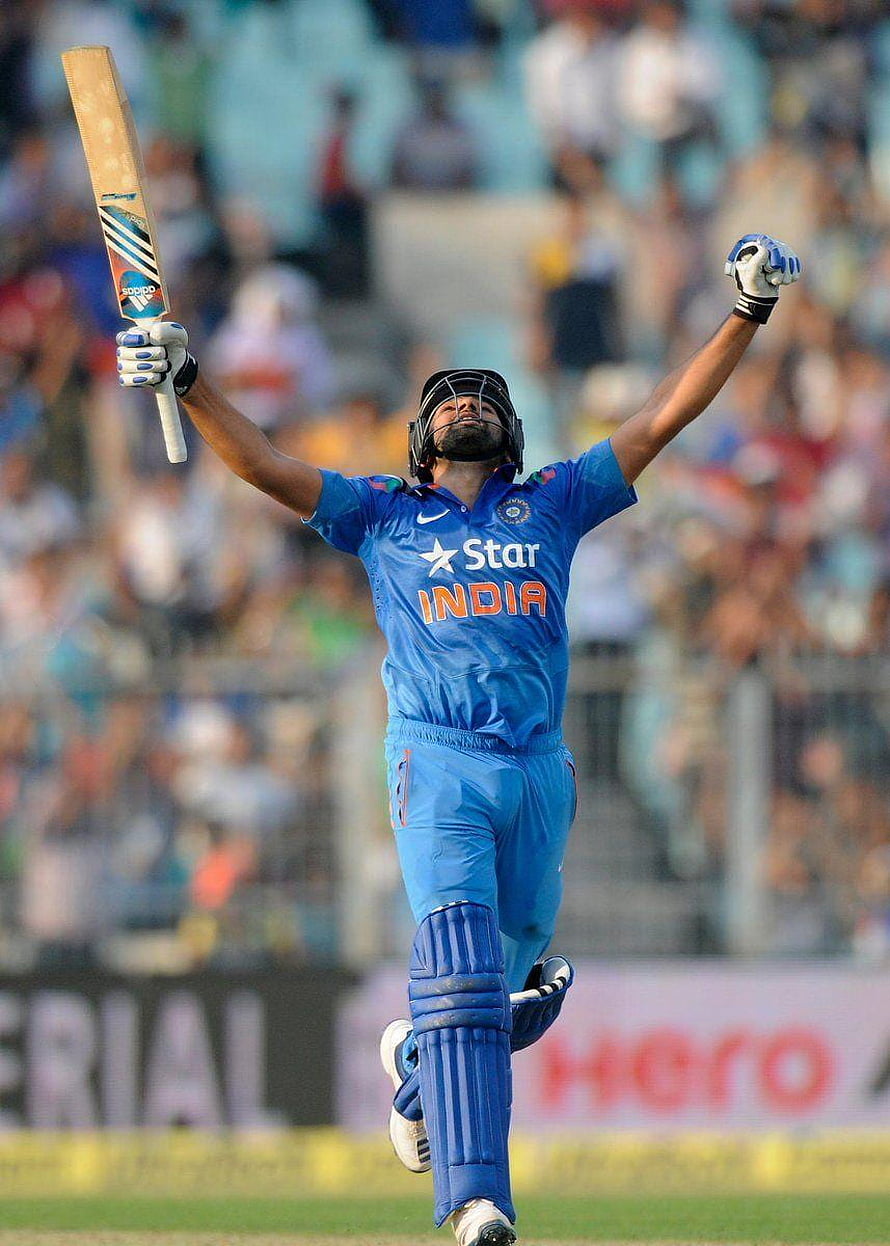 Rohit Sharma Celebrating a World Record ODI Century in Blue India Kit HD phone wallpaper