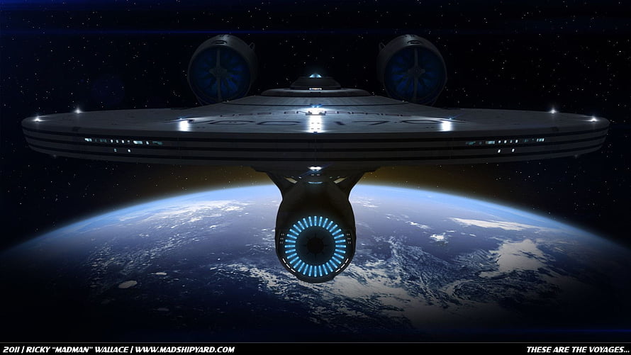 USS Enterprise Starship Hovering Above Earth in Deep Space HD wallpaper