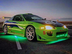 Mitsubishi Eclipse Green JDM Drift Car with Underglow on Sunset Road HD wallpaper