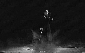 Black and white portrait of a distinguished gentleman in a trench coat holding a cane and cigarette, mustafa kemal ataturk, #Ataturk HD wallpaper