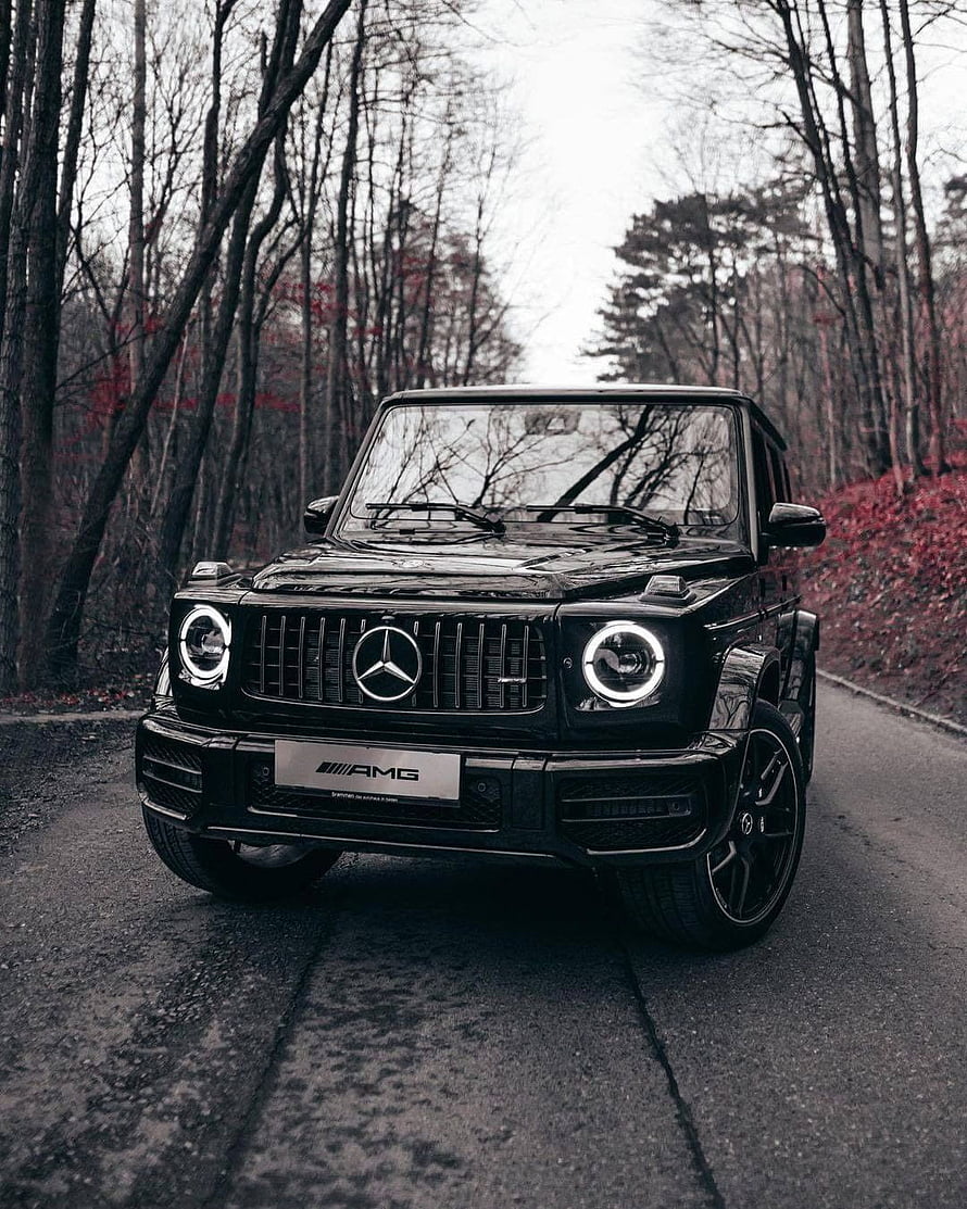 Black Mercedes-AMG G-Class SUV on a Forest Road HD phone wallpaper