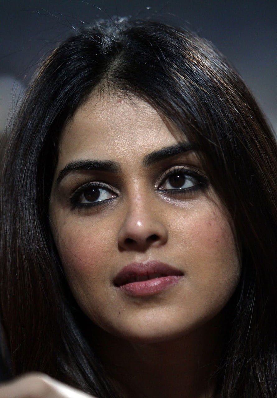 Genelia D'Souza Close-Up Portrait with Dark Hair and Intense Gaze HD phone wallpaper