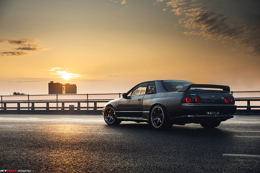 Nissan Skyline GT-R R32 Coupe Parked on Bridge at Golden Hour Sunset HD wallpaper