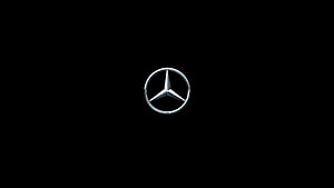 Mercedes-Benz Three-Pointed Star Emblem on Black Background HD wallpaper