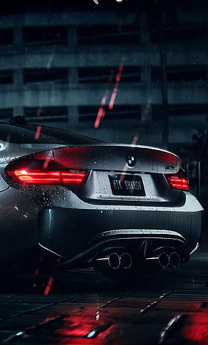 Rear View of a Black BMW M4 Coupe in the Rain with Glowing Red Taillights HD phone wallpaper