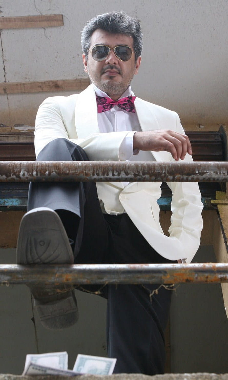 Ajith Kumar in white tuxedo with pink bow tie and aviator sunglasses HD phone wallpaper