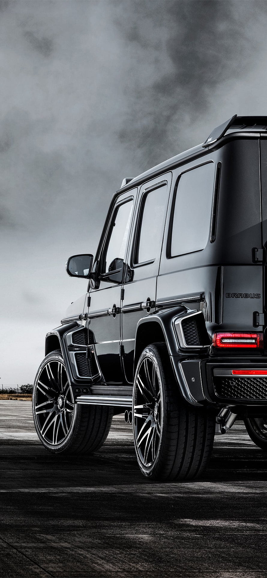 Black Brabus Mercedes G-Class SUV on a Smoky Track HD phone wallpaper