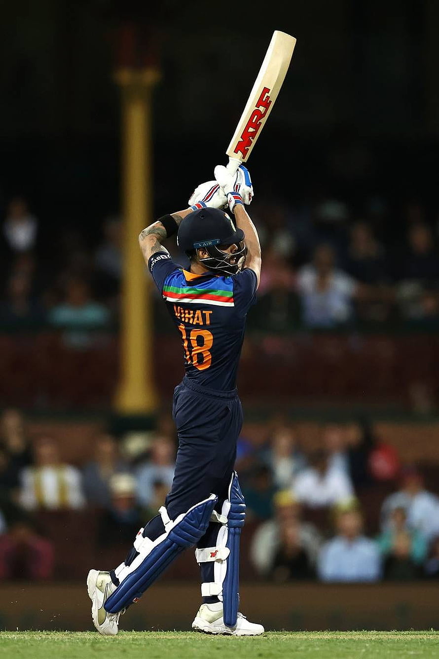 Virat Kohli Celebrating a Six in Indian Cricket Jersey HD phone wallpaper