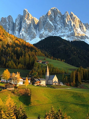 Alpine Village with Church and Snow-Capped Peaks in Autumn HD phone wallpaper