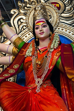 Goddess Durga Statue in Red Saree with Golden Crown and Jewelry HD phone wallpaper