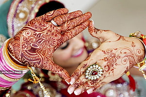 Elegant Bridal Mehndi Artwork With Traditional Jewelry And Intricate Henna Patterns HD wallpaper