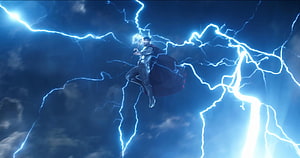 Thor wielding Mjolnir amid a storm of blue lightning in the dark sky HD wallpaper