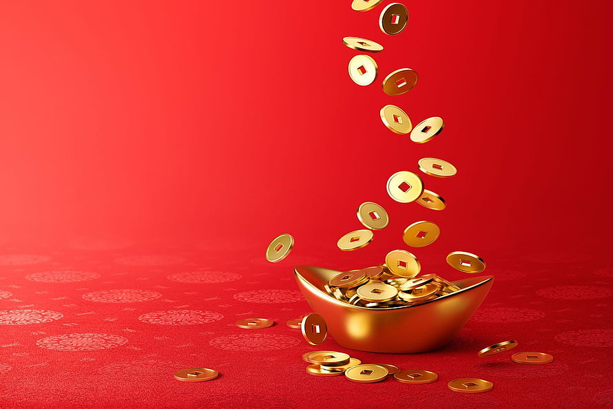 Golden ingot overflowing with flying coins on a festive red background HD wallpaper