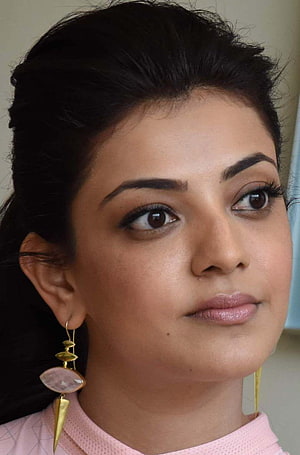 Kajal Aggarwal Close-Up Portrait Wearing Gold Earrings and Pink Top HD phone wallpaper