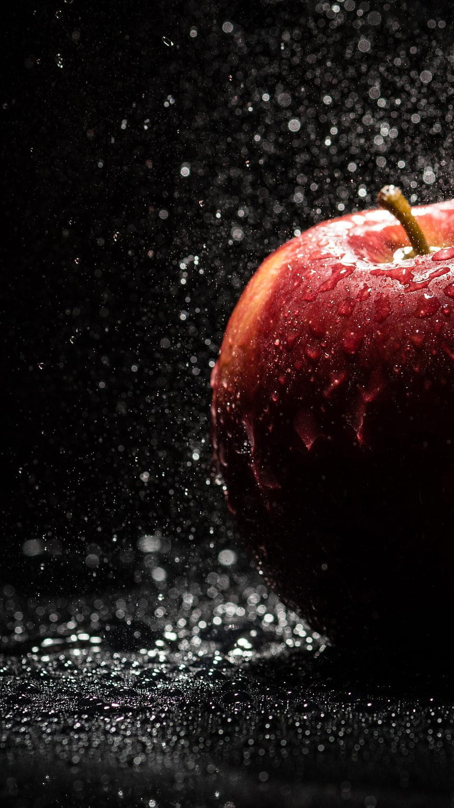 Glossy Red Apple with Water Droplets on Black Background HD phone wallpaper