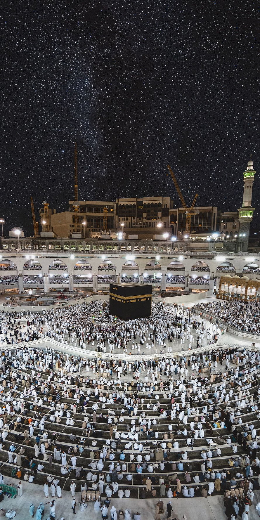 Night View of Kaaba in Mecca with Starry Sky and Pilgrims HD phone wallpaper