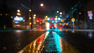 Rainy Night Street With Bokeh Lights And Wet Asphalt Reflections HD wallpaper