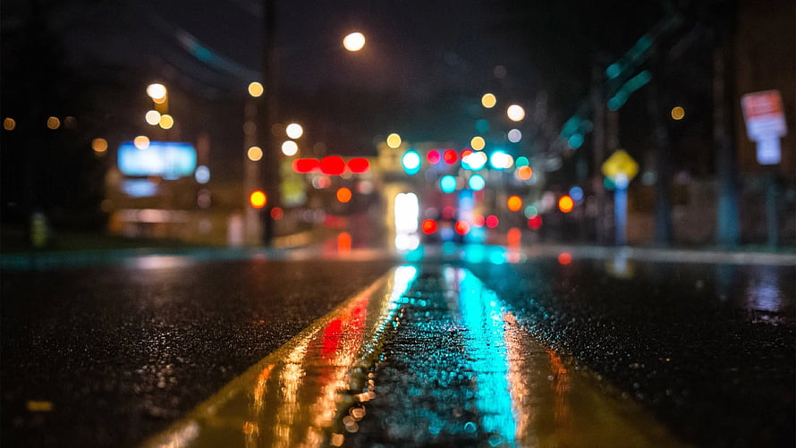 Rainy Night Street With Bokeh Lights And Wet Asphalt Reflections HD wallpaper