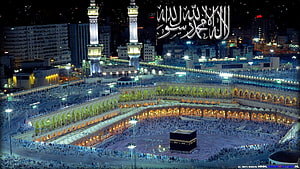 Night View of the Kaaba in Mecca with Crowds of Pilgrims and Illuminated Minarets HD wallpaper
