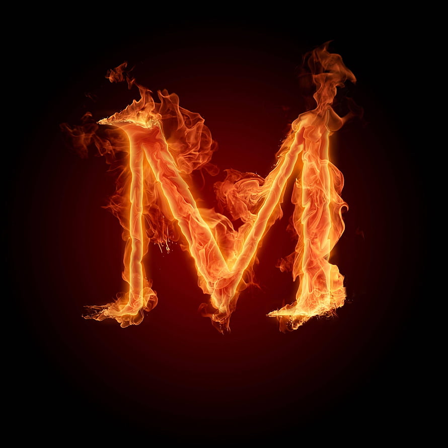Burning Letter M in Vivid Orange Flames on a Dark Background HD phone wallpaper