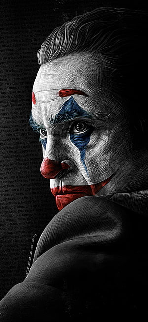 Joaquin Phoenix as the Joker in a dramatic monochrome portrait with red and blue clown makeup accents HD phone wallpaper